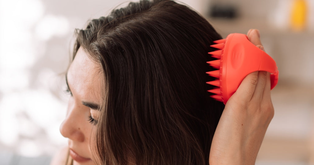 LumiScalp Scalp Massager - Woman using for hair growth