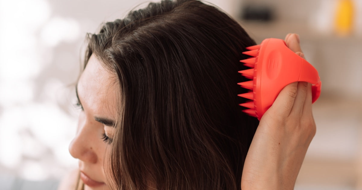LumiScalp Scalp Massager - Woman using for hair growth
